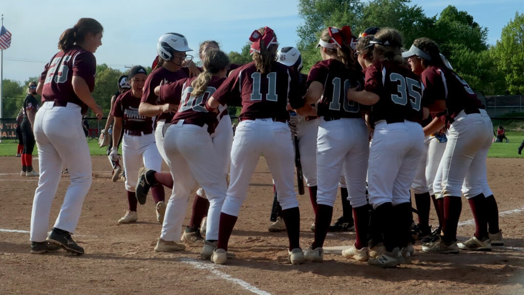 MadisonBoardman's Madison Lester (white helmet) is greeted by teammates after hitting a solo home run during Tuesday's Division I District semifinal in Massillon. Lester (white helmet) is greeted by teammates after hitting a solo home run during Tuesday's Division I District semifinal in Massillon.