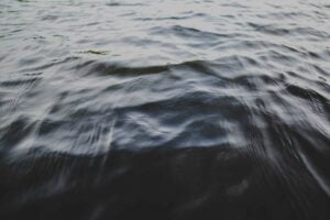 background-photo-of-gray-and-blue-water-ripples_t20_kopK9p-scaled