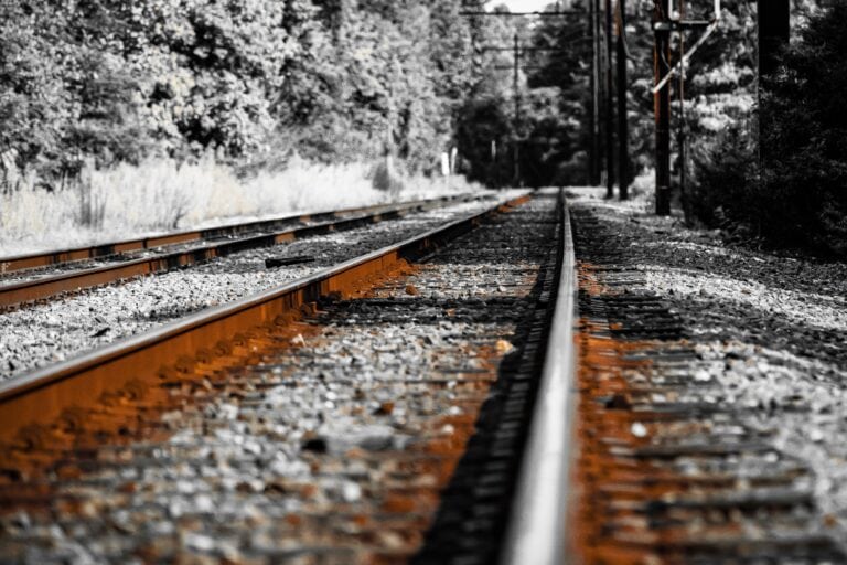 closeup of an rusty empty railway tracks during winter